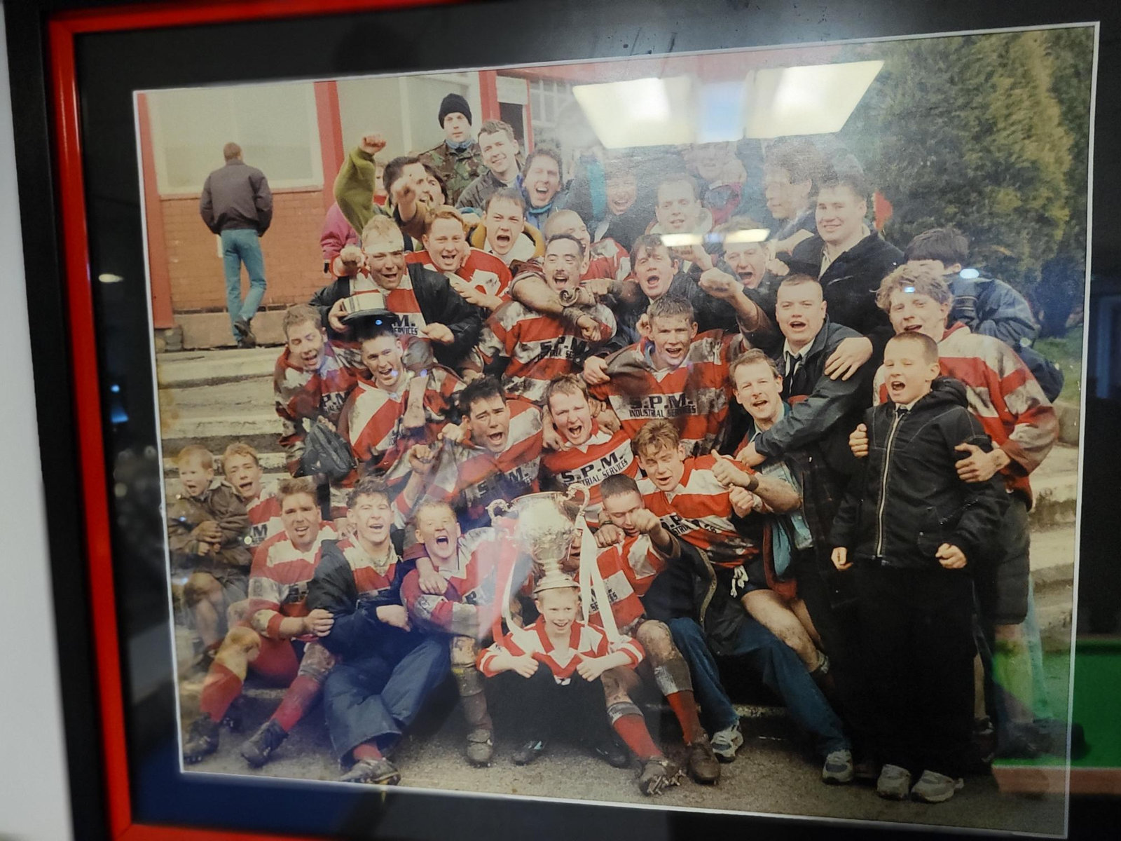 Higginshaw&rsquo;s 1994 cup winners celebrating with the trophy