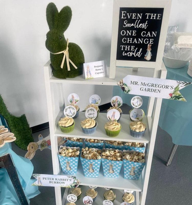 Peter Rabbit themed party table with cupcakes and popcorn